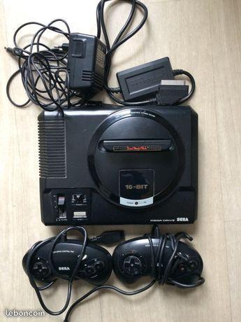 Sega megadrive 16bits avec 2 manettes et 5 jeux