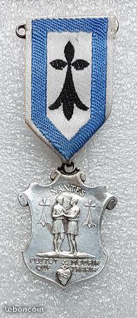 Insigne, Médaille religieuse